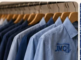 JMC embroidered corporate shirts on hangers